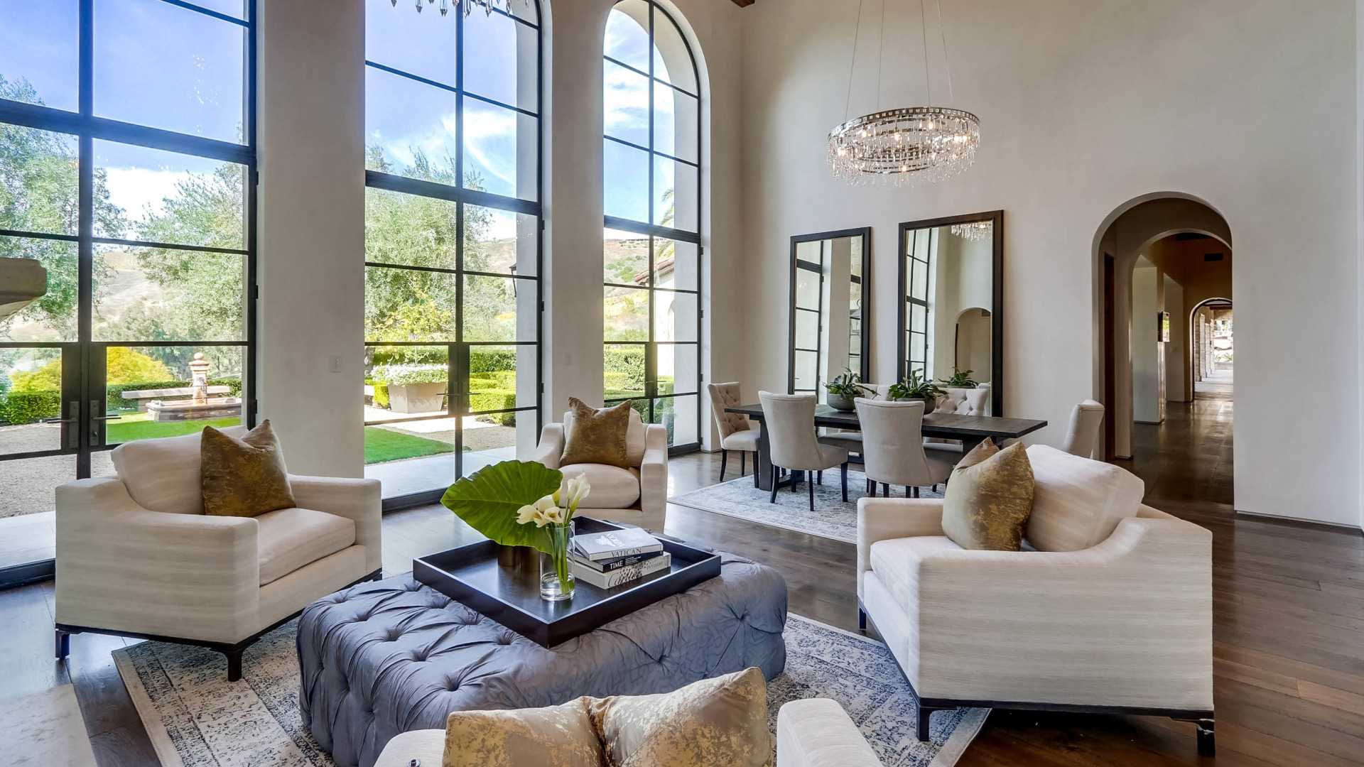 Modern Mediterranean-style luxurious villa interior with living and dining areas.