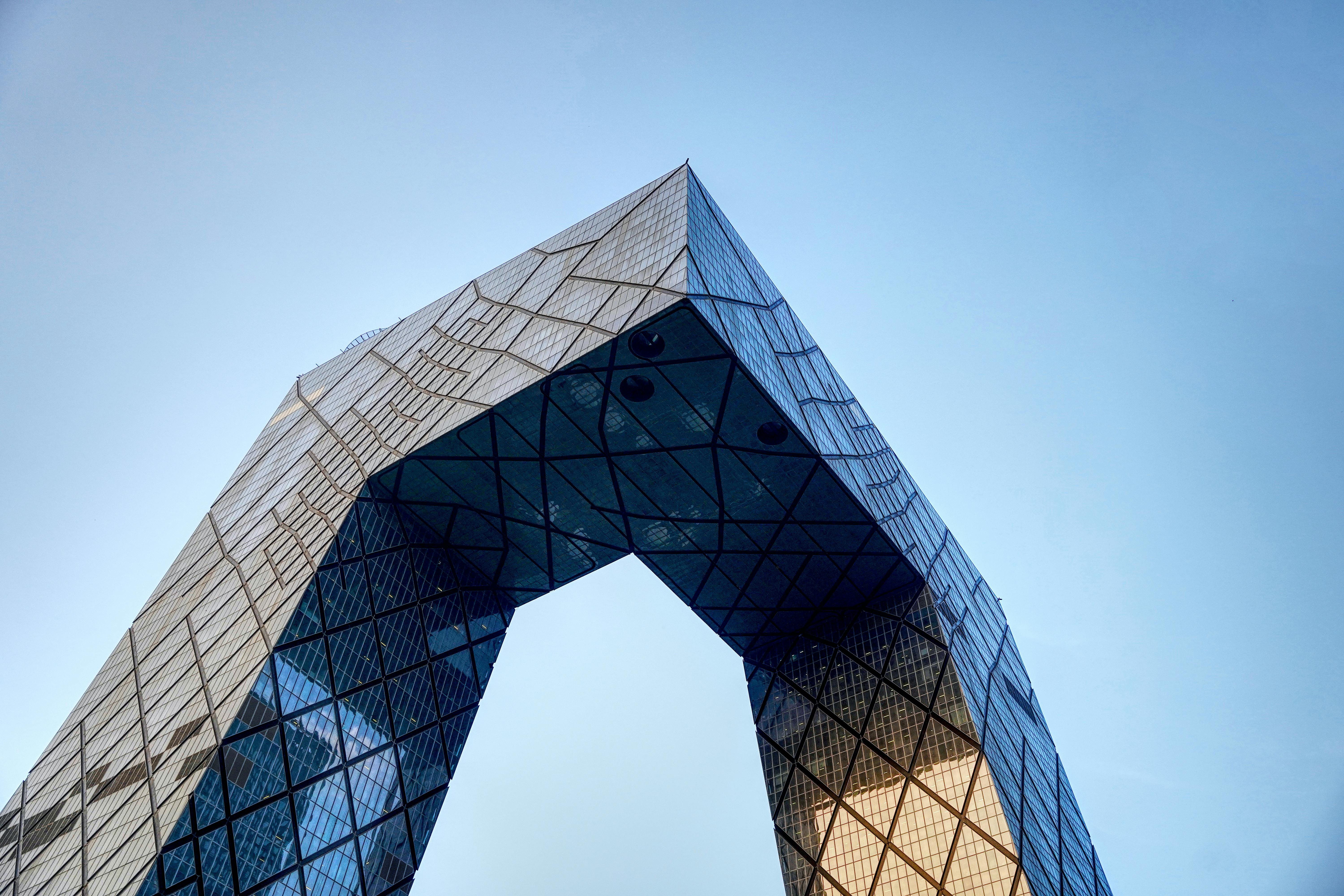 Low-angle view of the CCTV Headquarters in Beijing designed by Rem Koolhaas.
