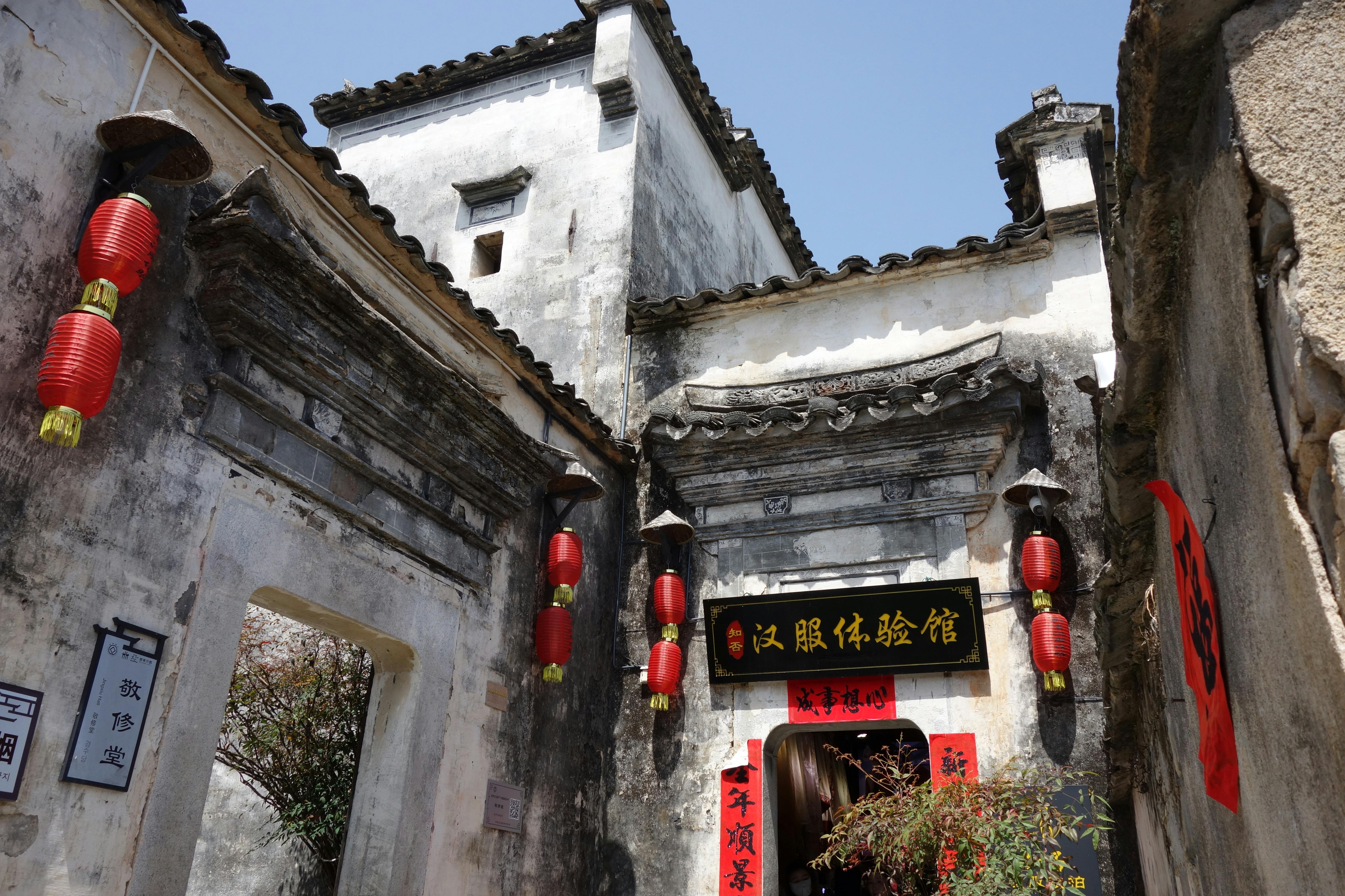 Traditional Chinese unusual houses decorated with red lanterns.