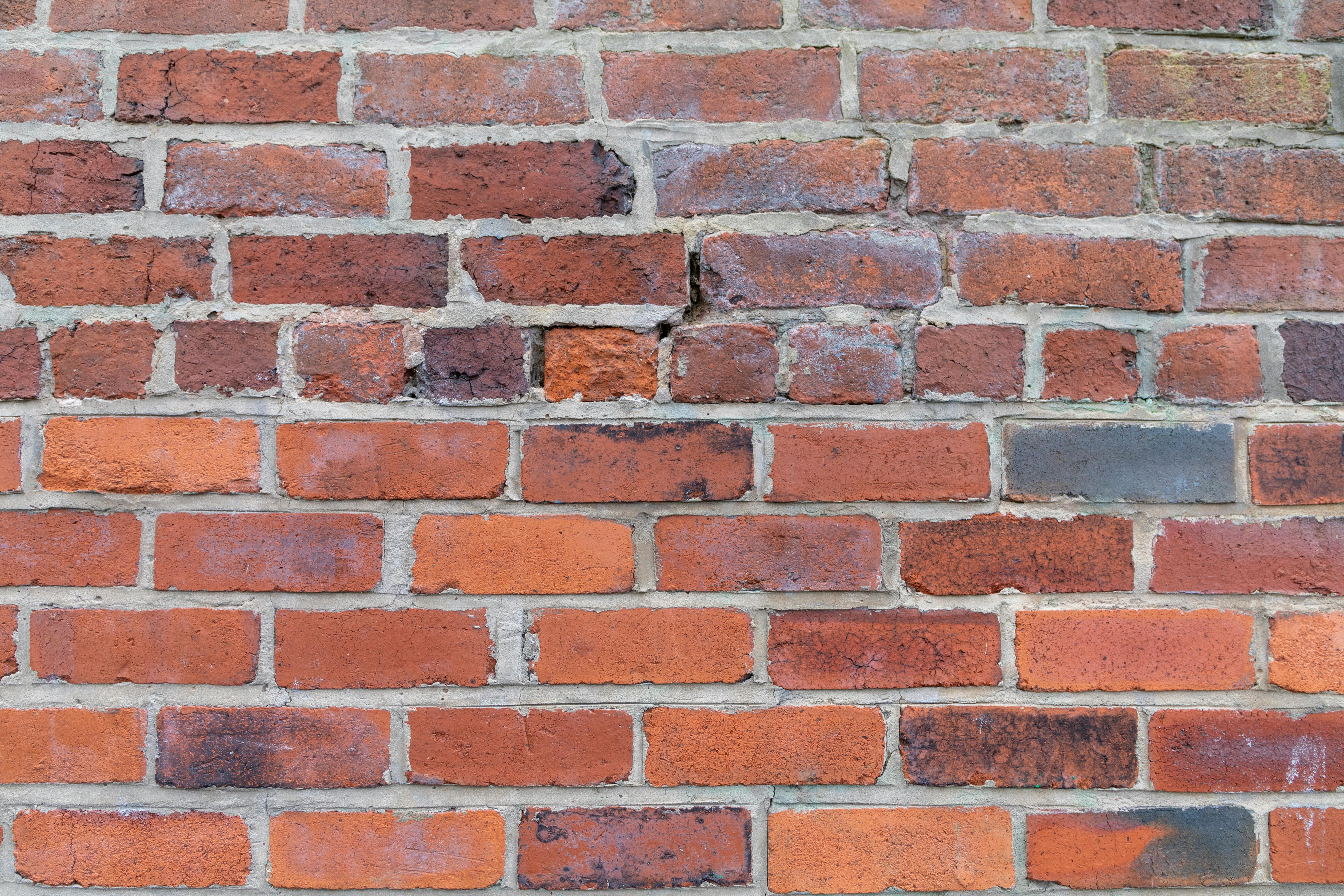 Weathered bricks with failing mortar.