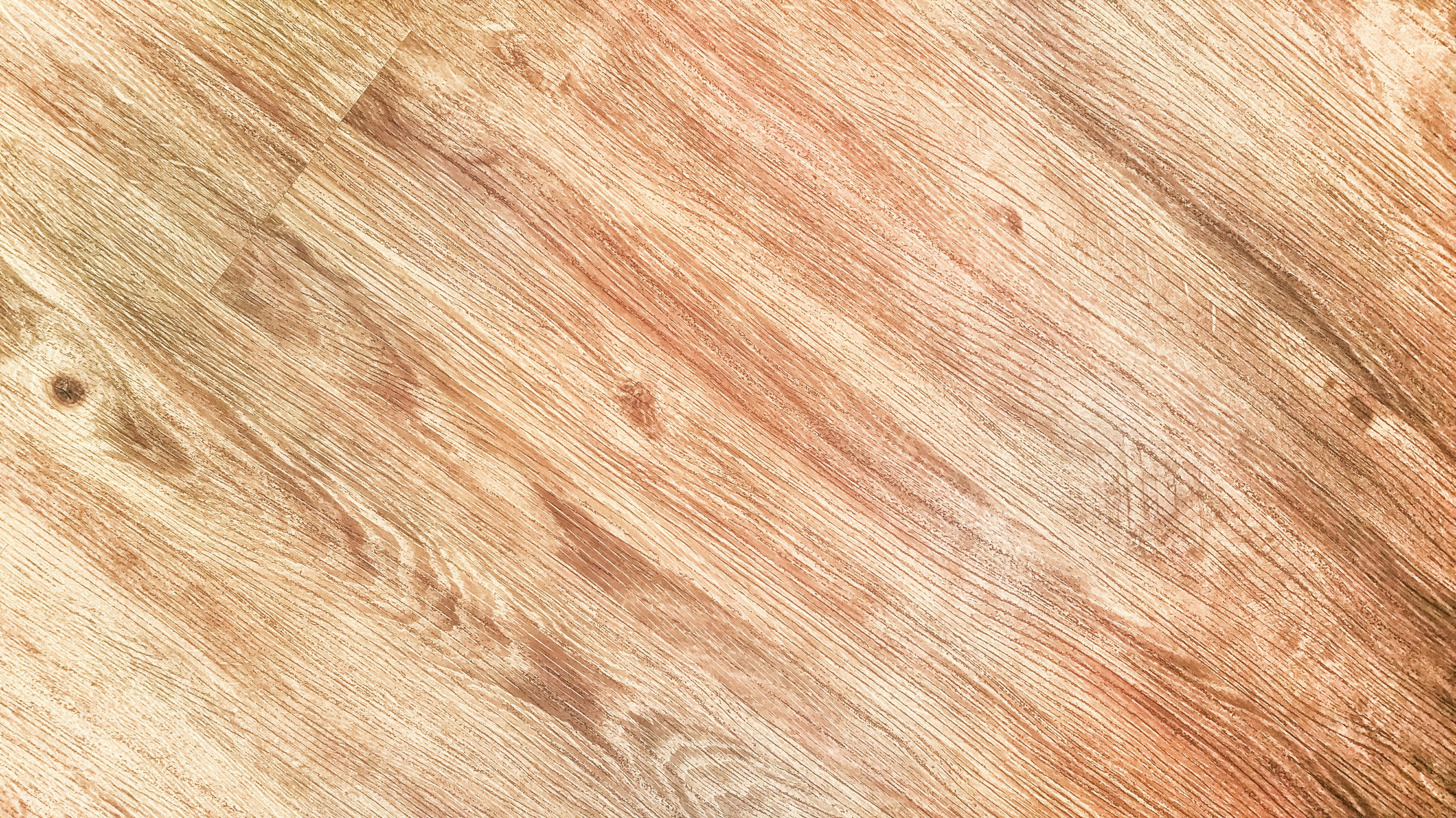 Close-up of brown wooden surface.