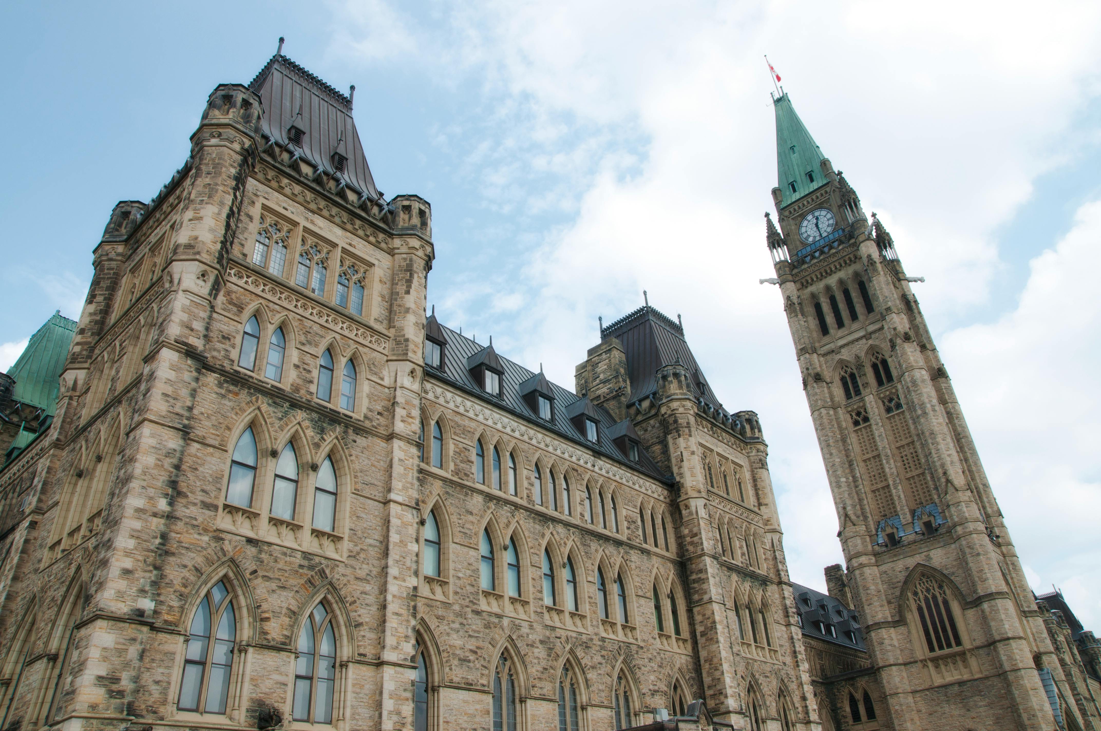 Restored Canadian Parliament facade with Peace Tower.
