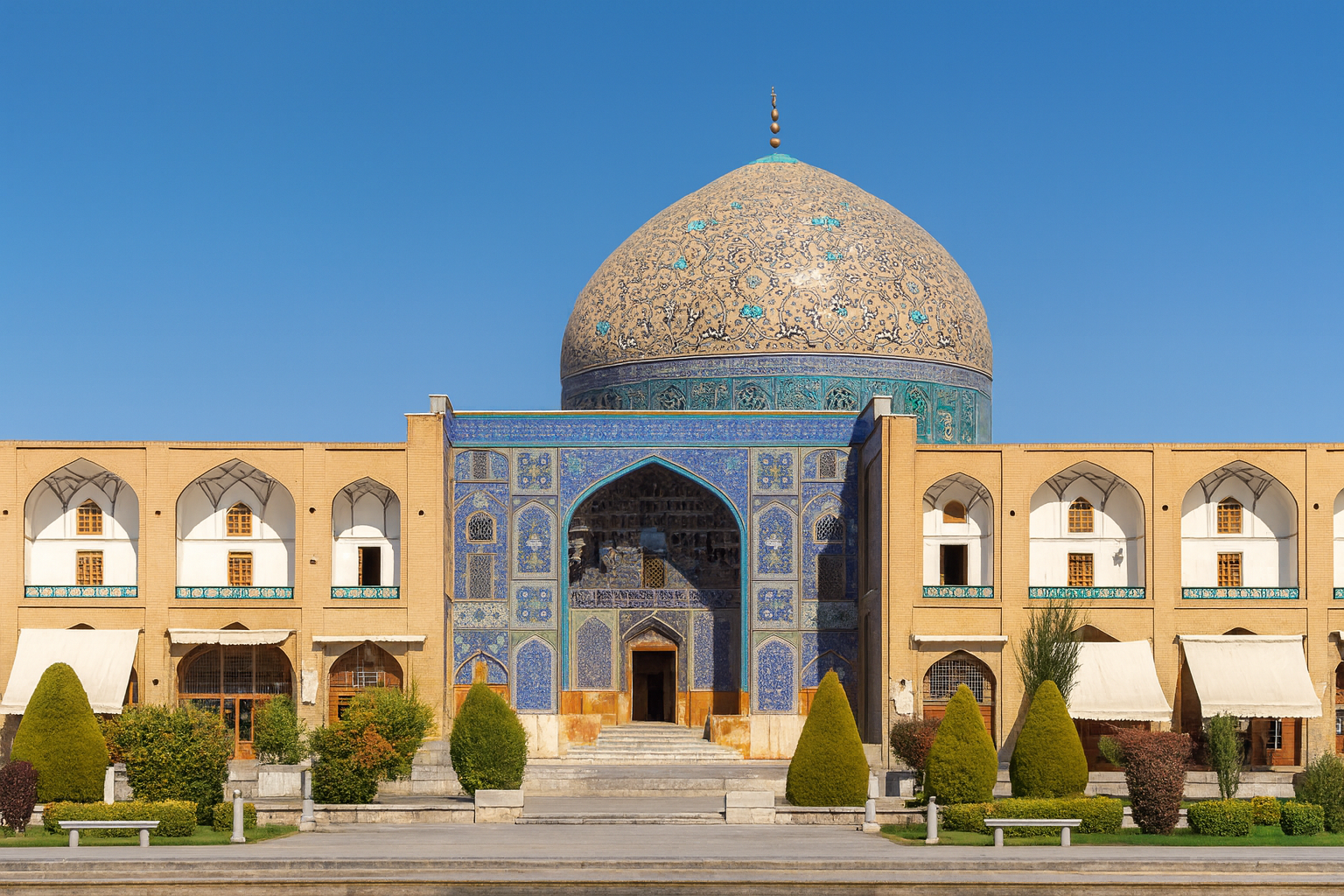 Exterior of Sheikh Lotfollah Mosque in Isfahan, Iran, with ornate dome and tile work.