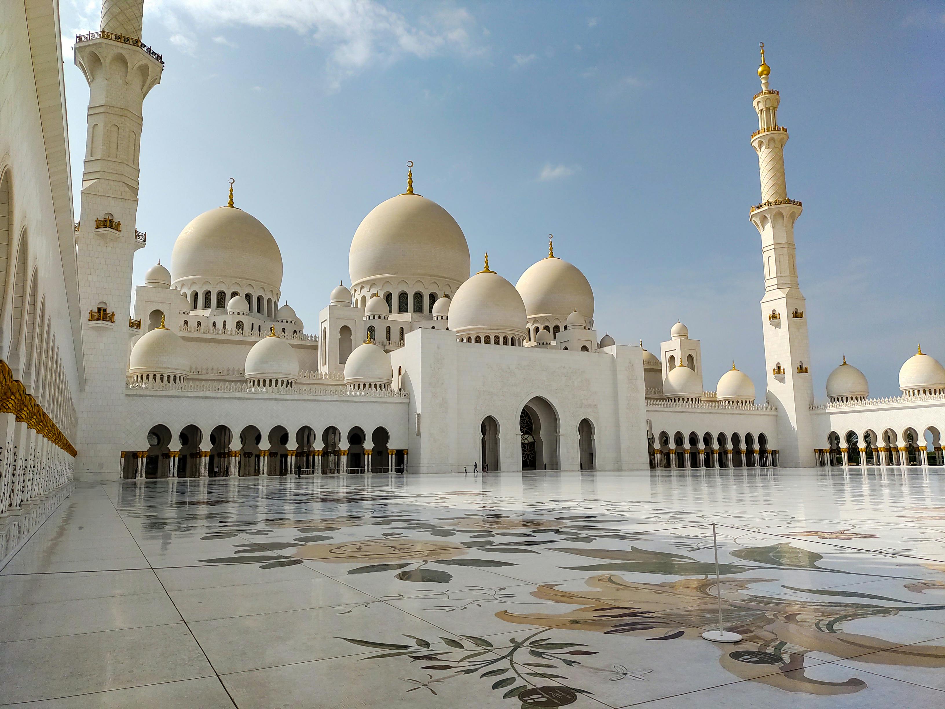 Courtyard of Sheikh Zayed Grand Mosque with floral marble.