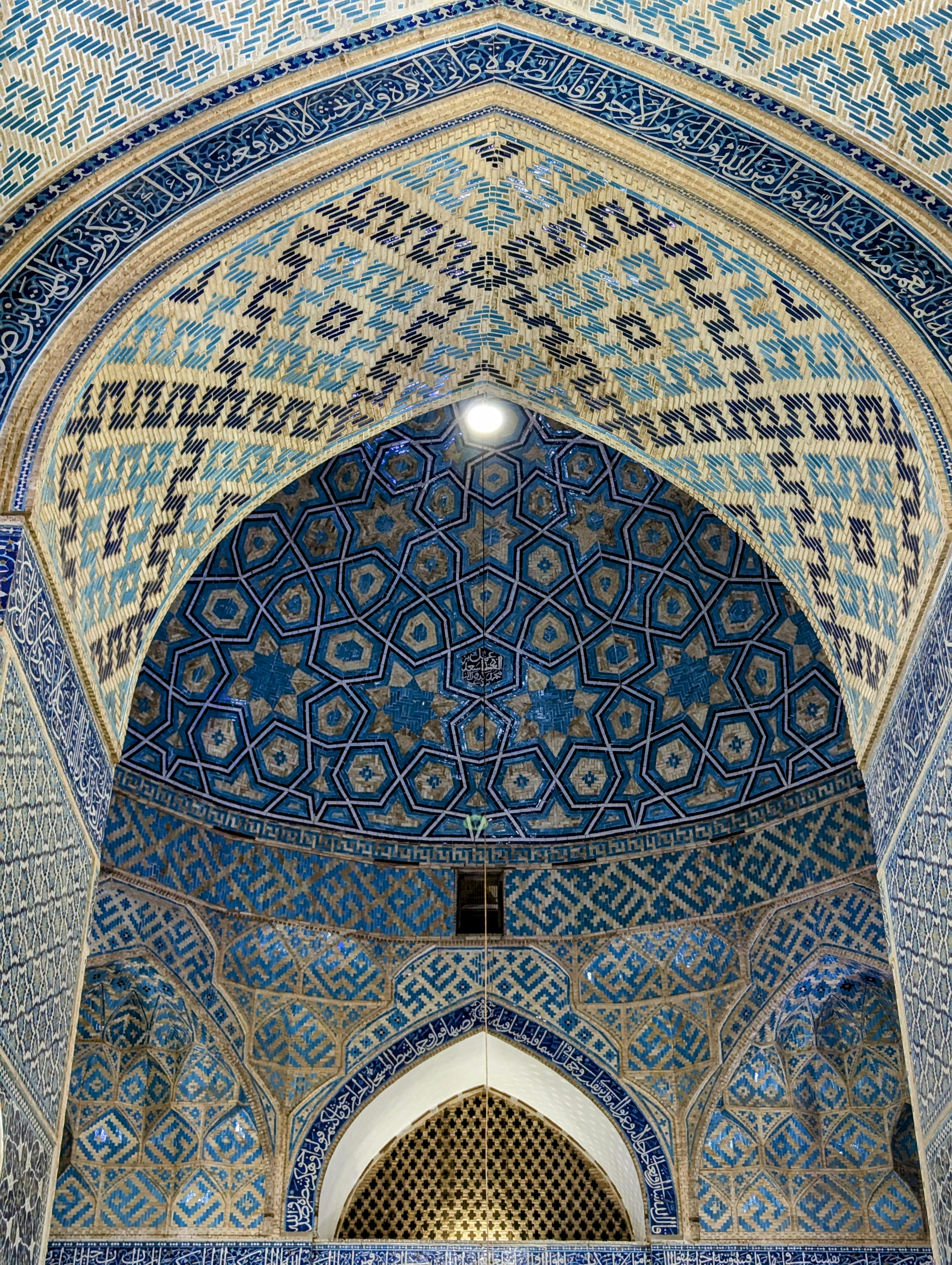 Intricate tile work inside the Yazd Mosque, Iran.