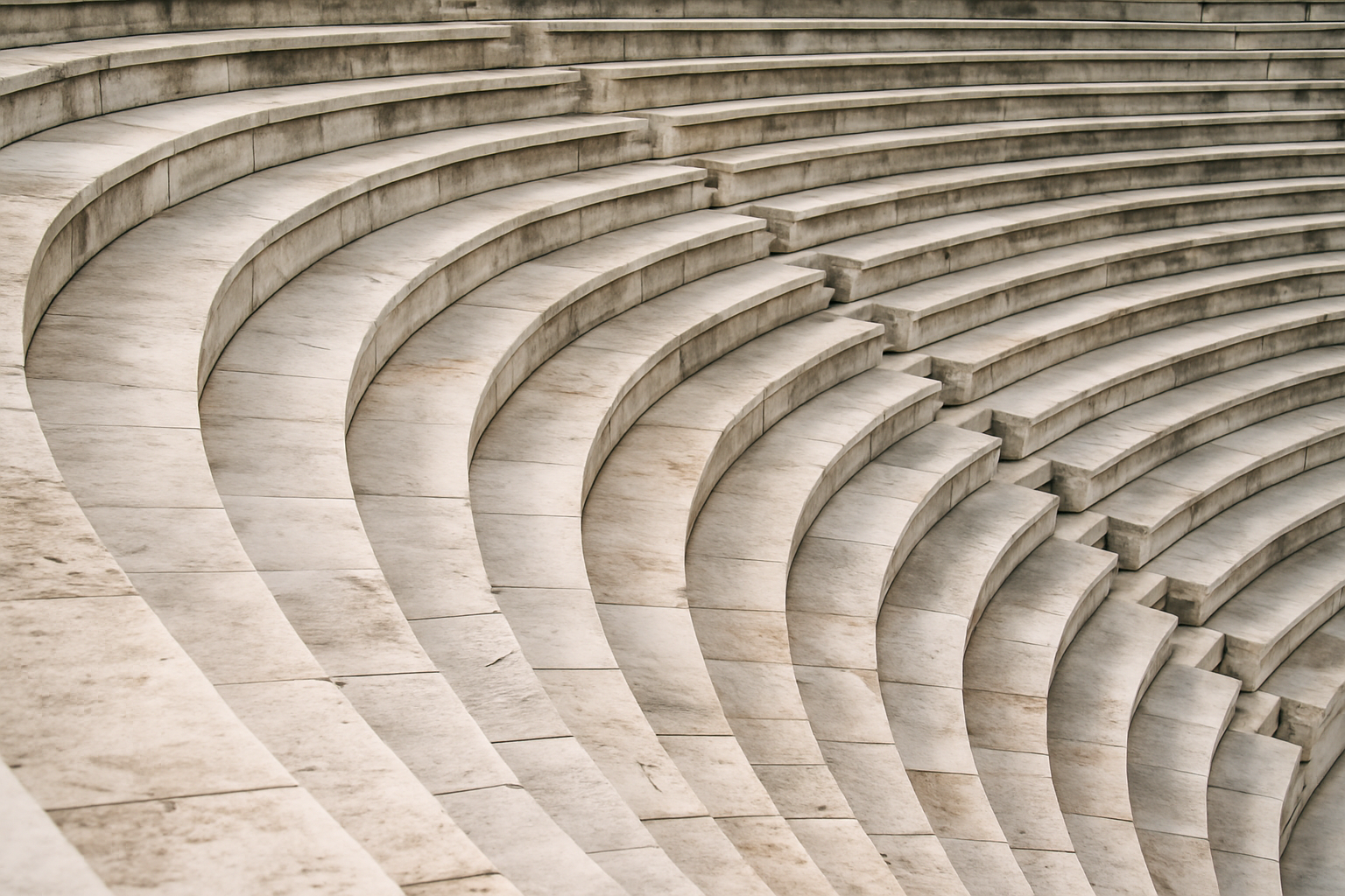 Curved marble seating of an ancient amphitheater.