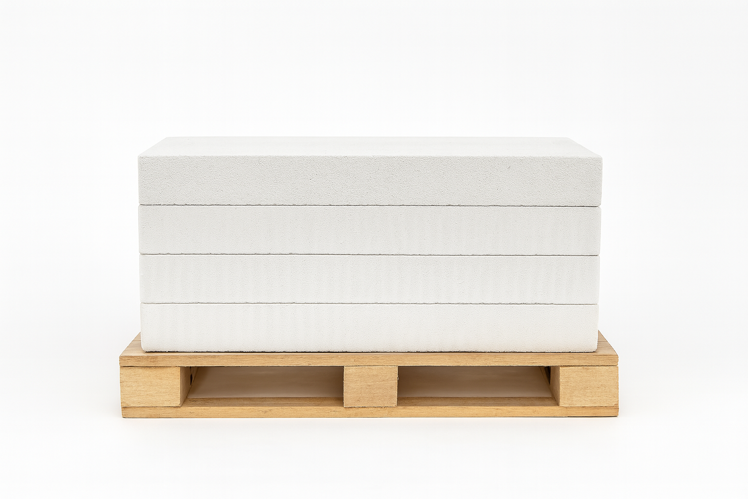 Stack of white autoclaved aerated concrete (AAC) blocks.