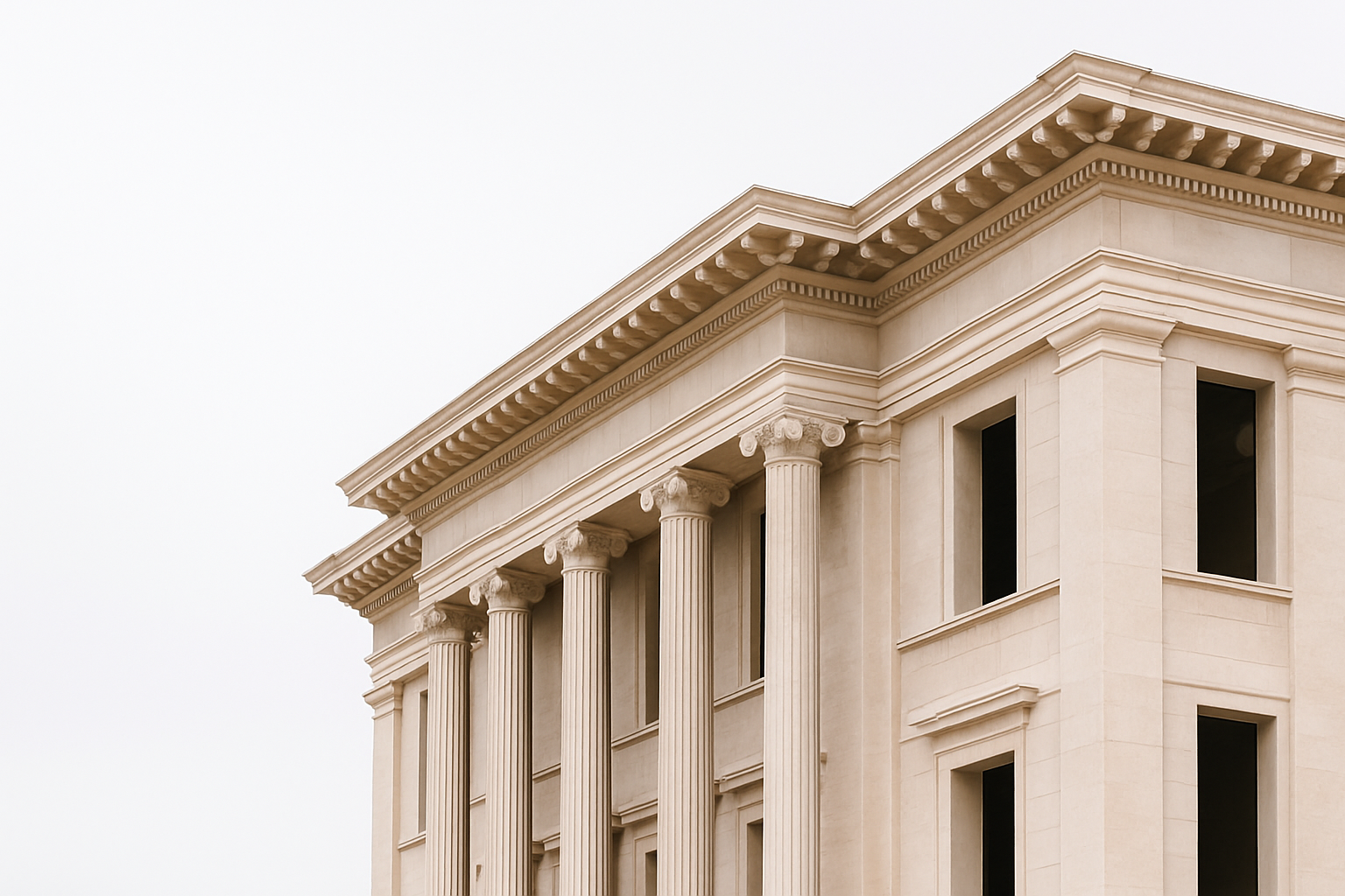Greek Revival style building with classical columns and triangular roofline.