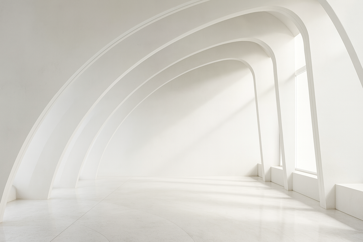 Curved white architectural arches showcasing symmetry and balance in a minimal modern space.