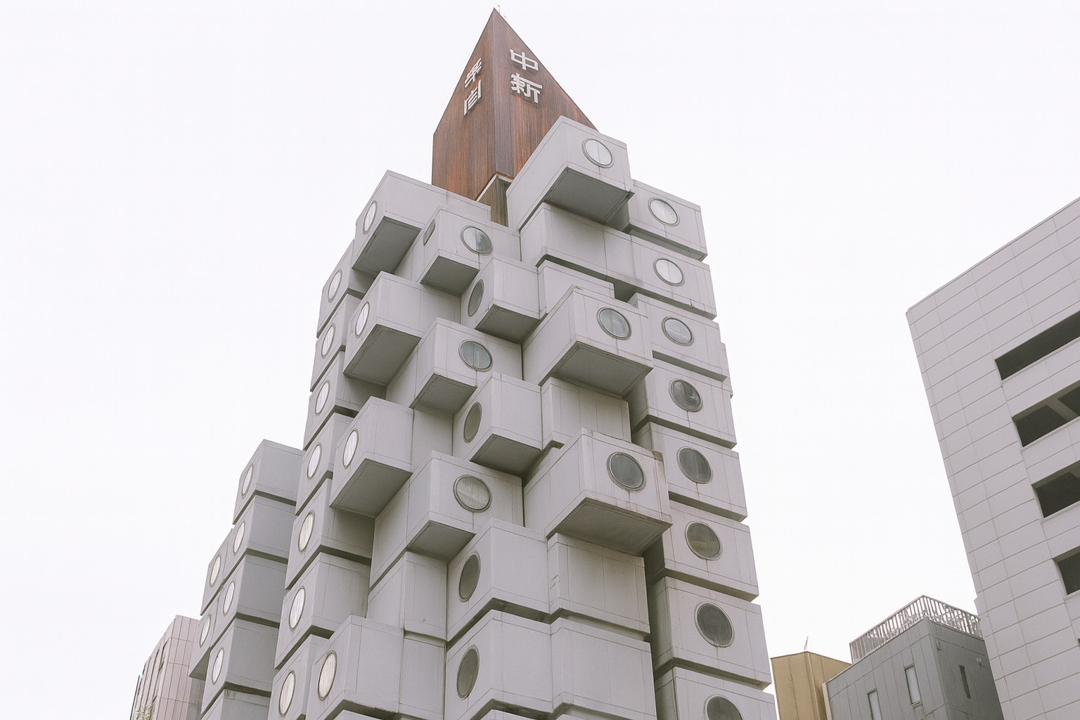 Tokyo’s Nakagin Capsule Tower in realistic color, highlighting its Brutalist modular design and architectural geometry.