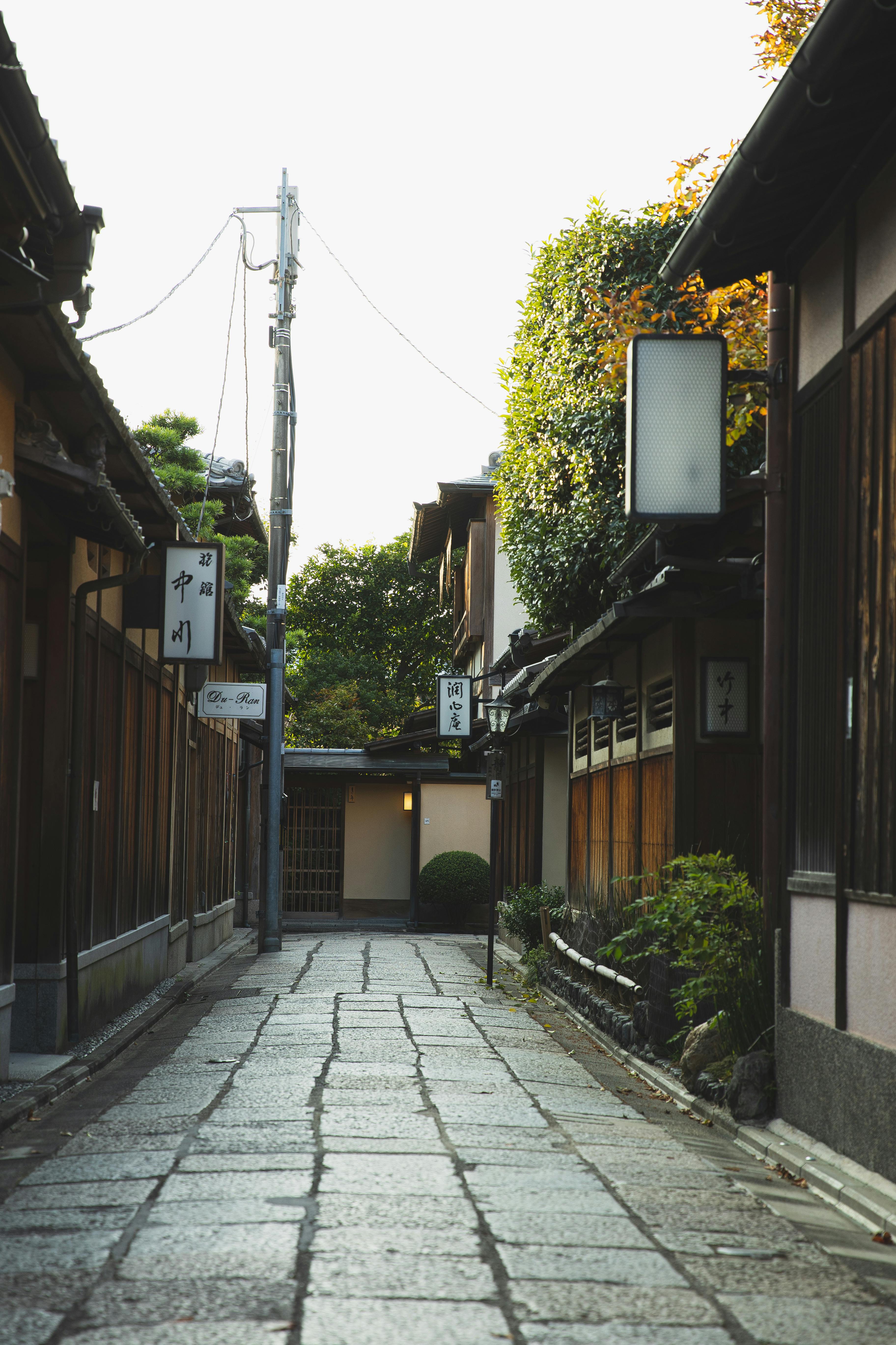 Quiet Kyoto alleyway showing how wood, stone, and air shape the sensory design of space through scent and atmosphere.