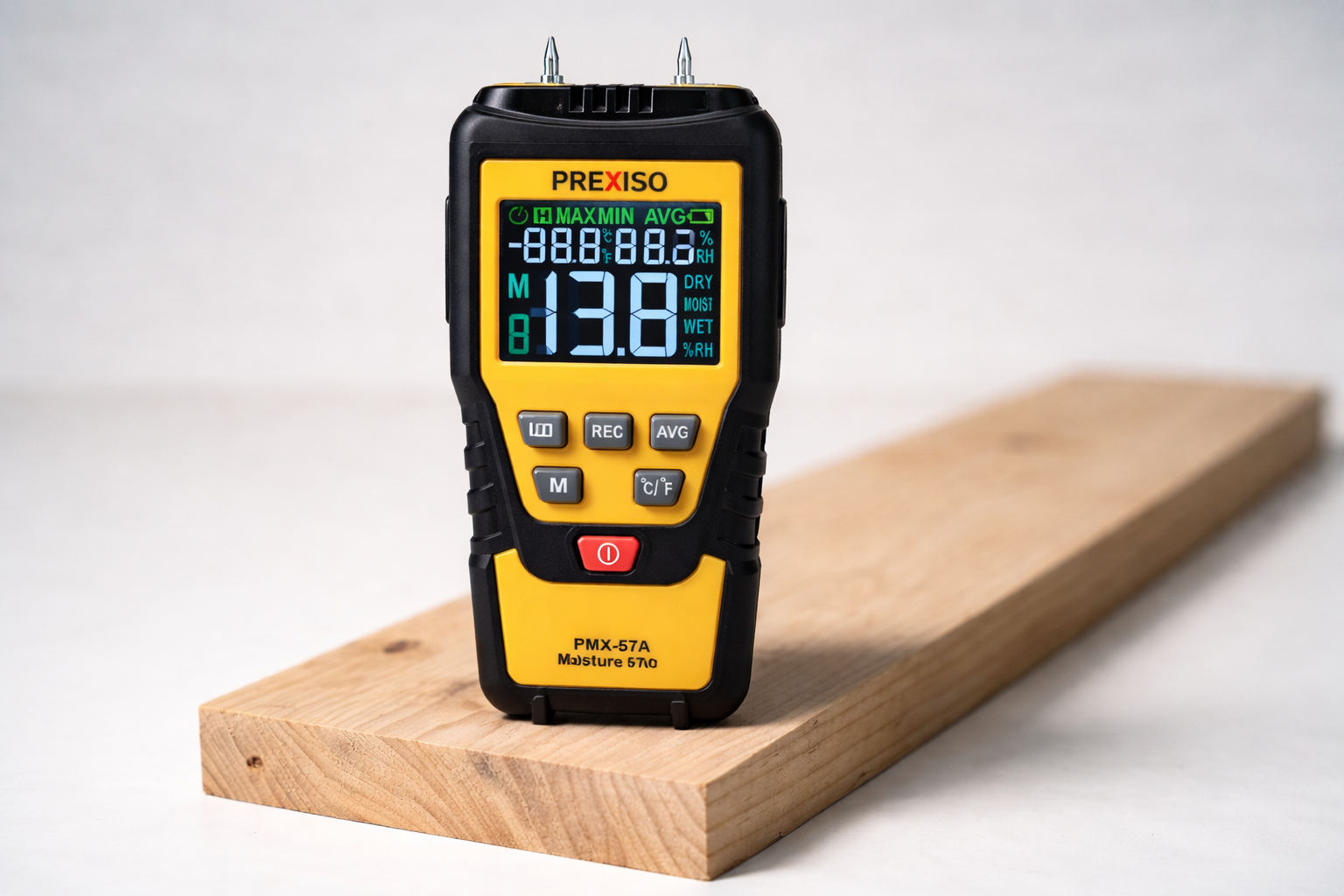 Pin-type wood moisture meter measuring moisture content in a wood board.