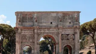 Arch of Constantine in Rome with detailed carvings and historic structure.