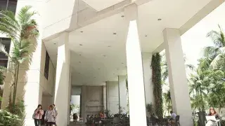 Architecture students walking on university campus in Coral Gables.