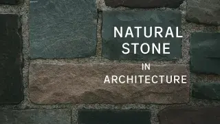 Modern architectural facade featuring natural stone blocks with varied textures and tones.