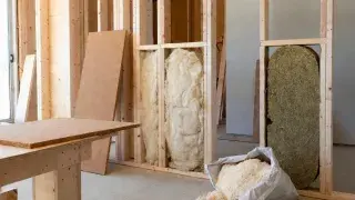 How to choose the best sustainable insulation – natural sheep wool, hemp batts and cork boards in real renovation wall.