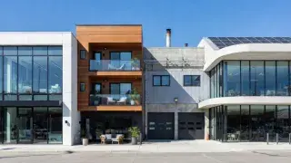 Commercial, residential, and light industrial building forms shown side by side in a modern streetscape.