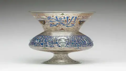 Mamluk lamp with intricate calligraphy and vibrant colors.