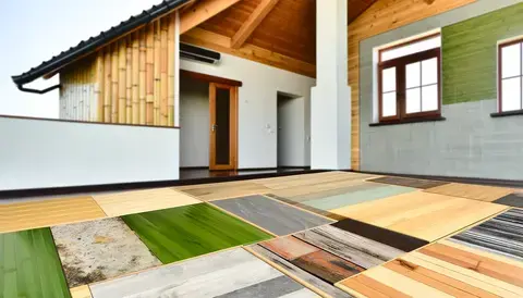 House using sustainable materials such as bamboo, reclaimed wood, and recycled metal in its design.