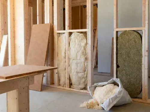 How to choose the best sustainable insulation – natural sheep wool, hemp batts and cork boards in real renovation wall.