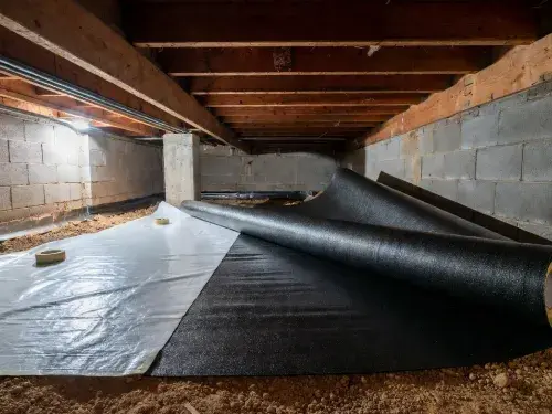Crawl space vapor barrier materials compared by thickness inside a real crawl space.