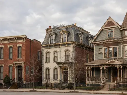 Italianate, Second Empire, and Queen Anne houses showing three Victorian architecture styles.