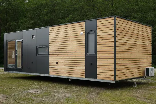 Movable tiny house model ADRIA designed as a compact, functional living caravan.